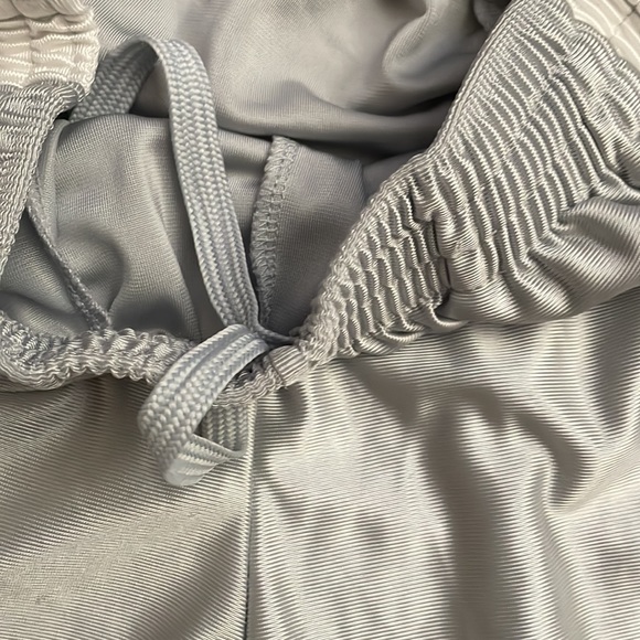 Mens size small silver Champion brand shorts with white strip and black piping. - Picture 5 of 9